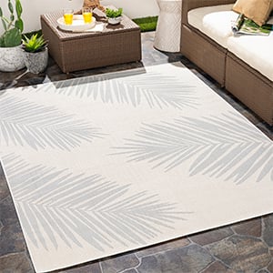 Outdoor rugs are the perfect way to make your patio space feel more like your outdoor living room